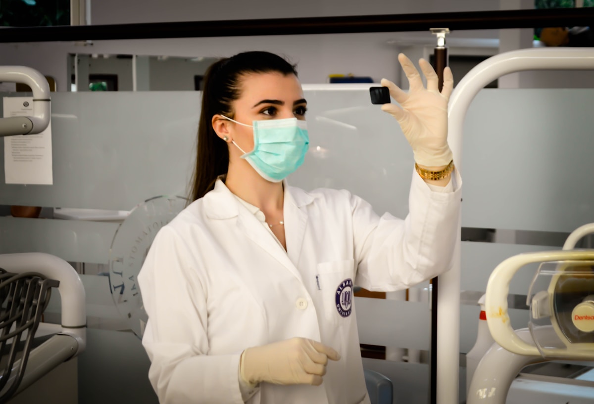 Female medical professional reviewing patient scan